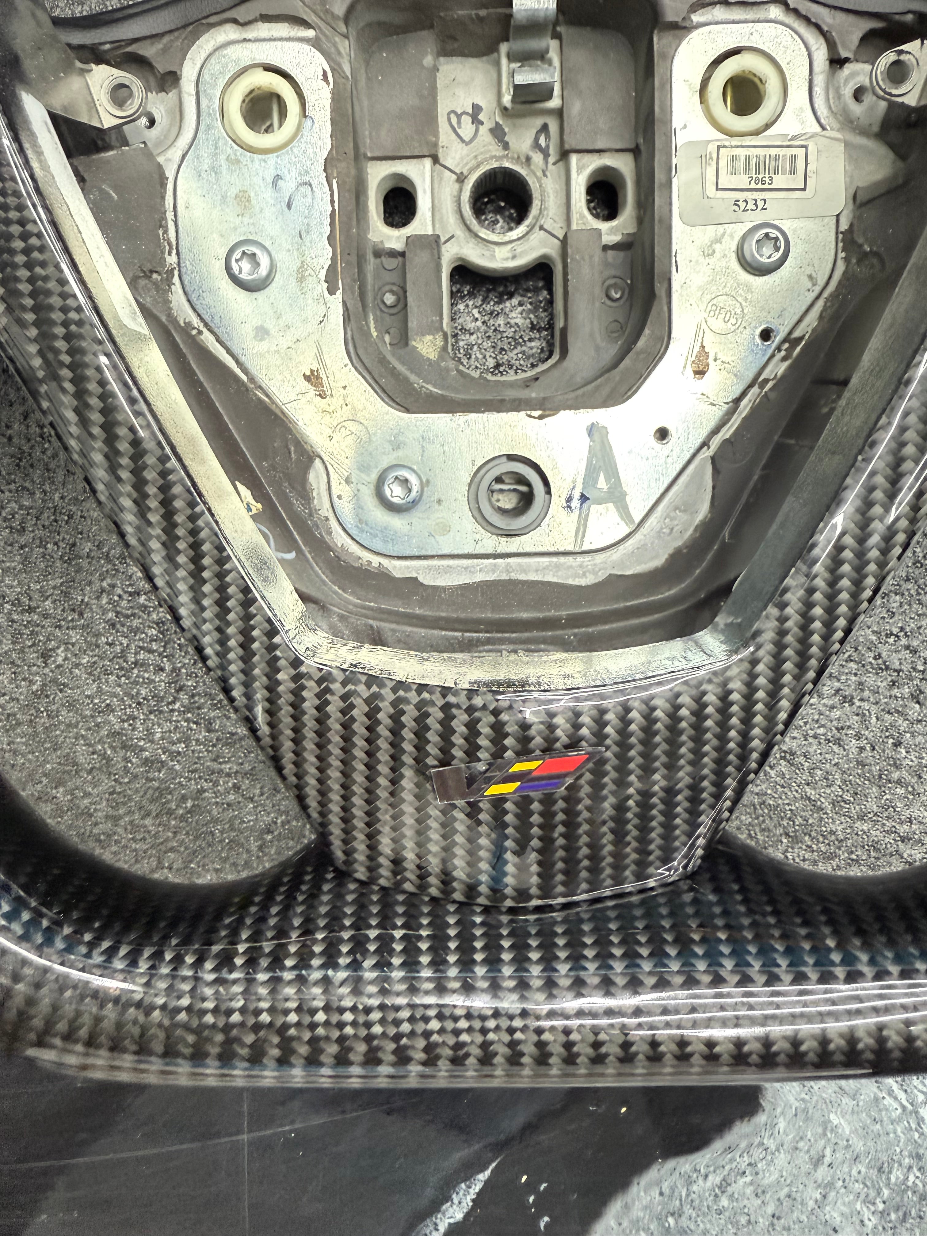 2003 - 2008 CTS, CTS-V V1 Custom Carbon Fiber Steering Wheel with Perforated Leather Hand Grips / Leather Rear Cover